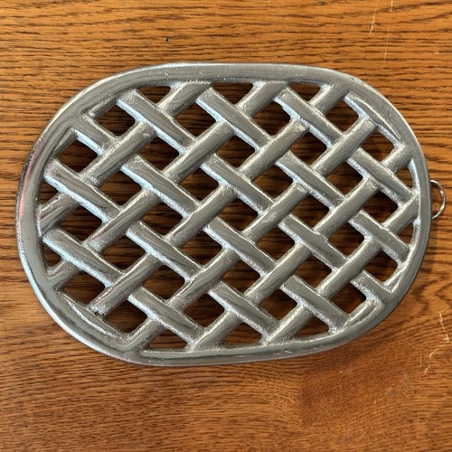Chrome cast iron - stove, trivet