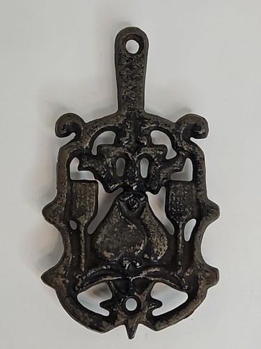 Antique cast iron trivet brown - cast,