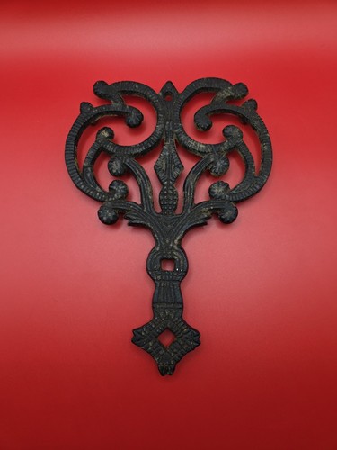 Cast iron trivet ornate - iron,